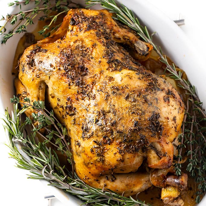 https://www.justaddglam.com/wp-content/uploads/2020/01/wholesomeyum-crock-pot-whole-chicken-recipe-with-garlic-herb-butter-4.jpg